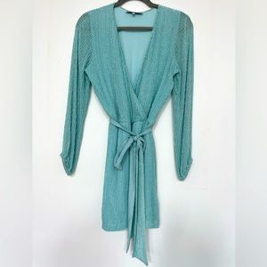 Teal short beaded dress.